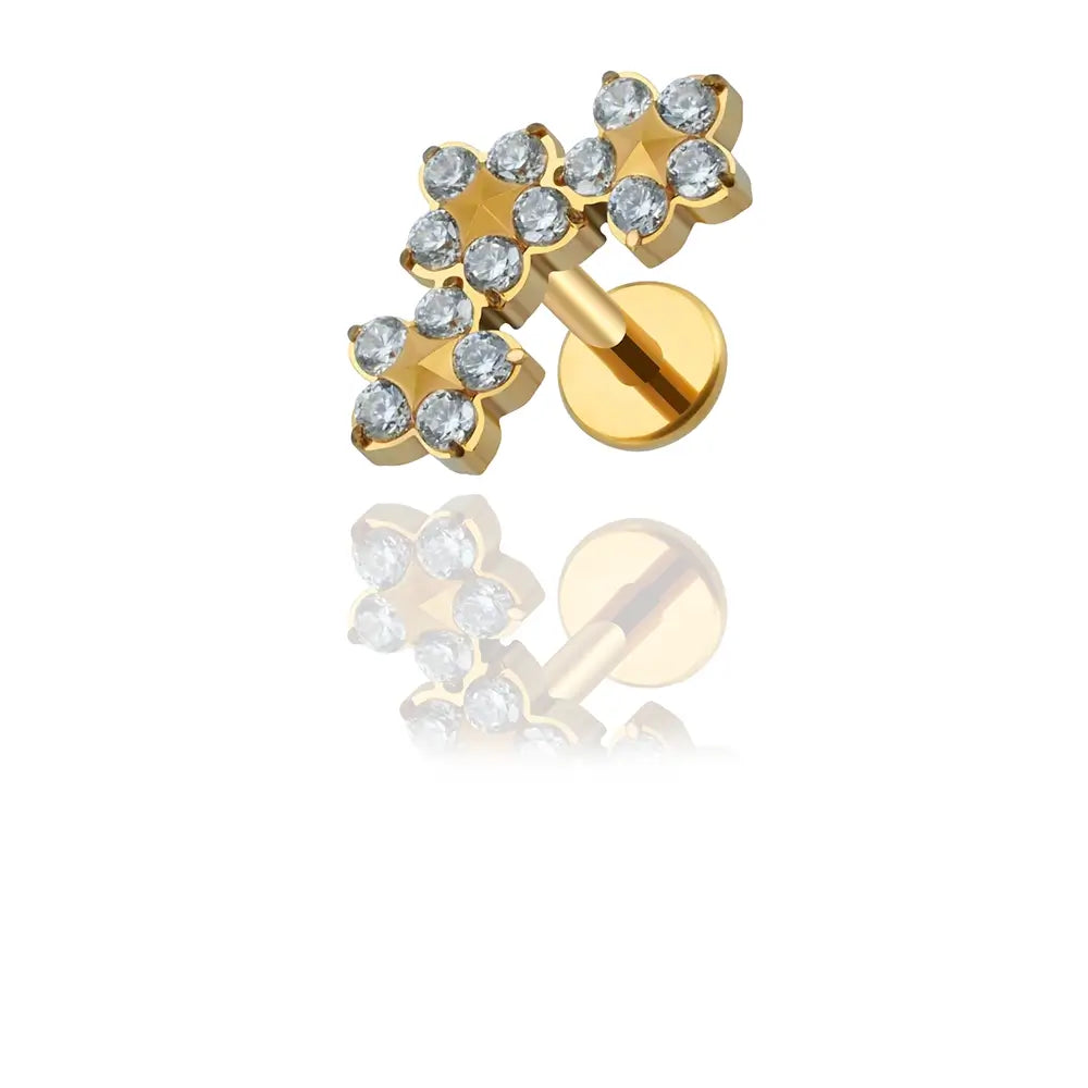 Labret piercing triple fleur avec pierre de zircon. Finition Pvd Or