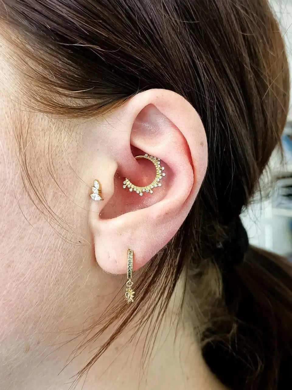 Piercing Velaryan porté sur daith par une cliente